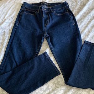 Express dark wash skinny mid rise jeans size 8 short